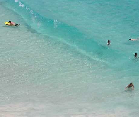 Barbados surfing and swimming