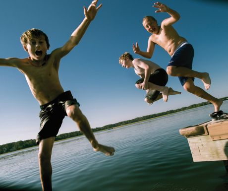 Children jumping off the dock at Hilton Head