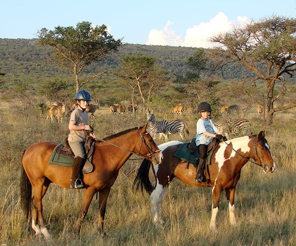 Children riding horseback at Ant's Collection