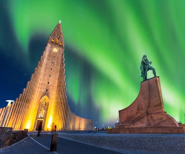 Iceland's capital and the Northern Lights above