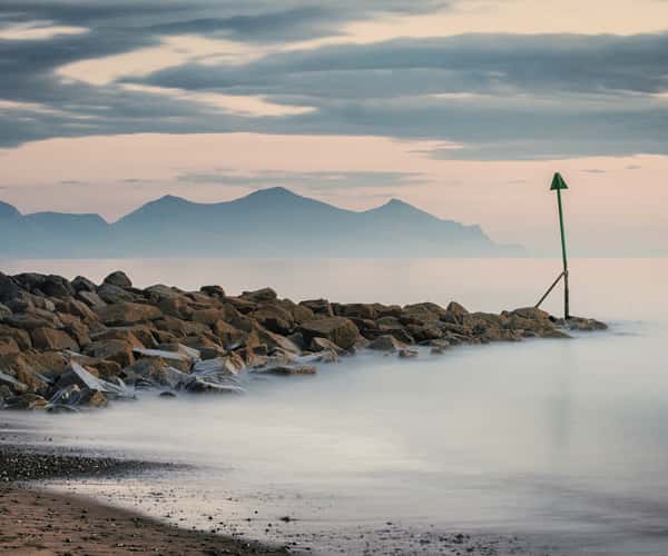 The rugged landscape of Dinas Dinlle beach near Caernarfon