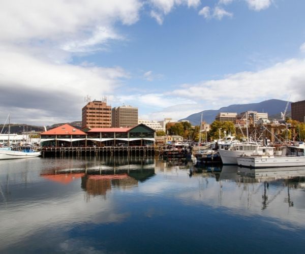 Boats and buildings surrounding a waterfront