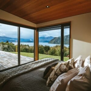 The master bedroom at Aurum, a luxury private villa on the shore of Lake Wanaka that sleeps 2-4 guests.