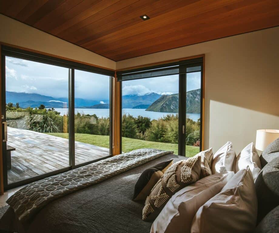 The master bedroom at Aurum, a luxury private villa on the shore of Lake Wanaka that sleeps 2-4 guests.